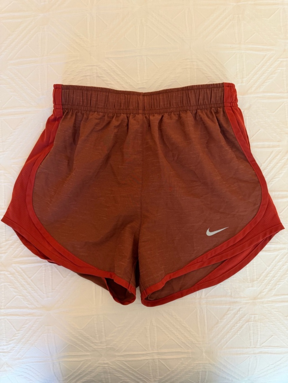 Orange Nike shorts